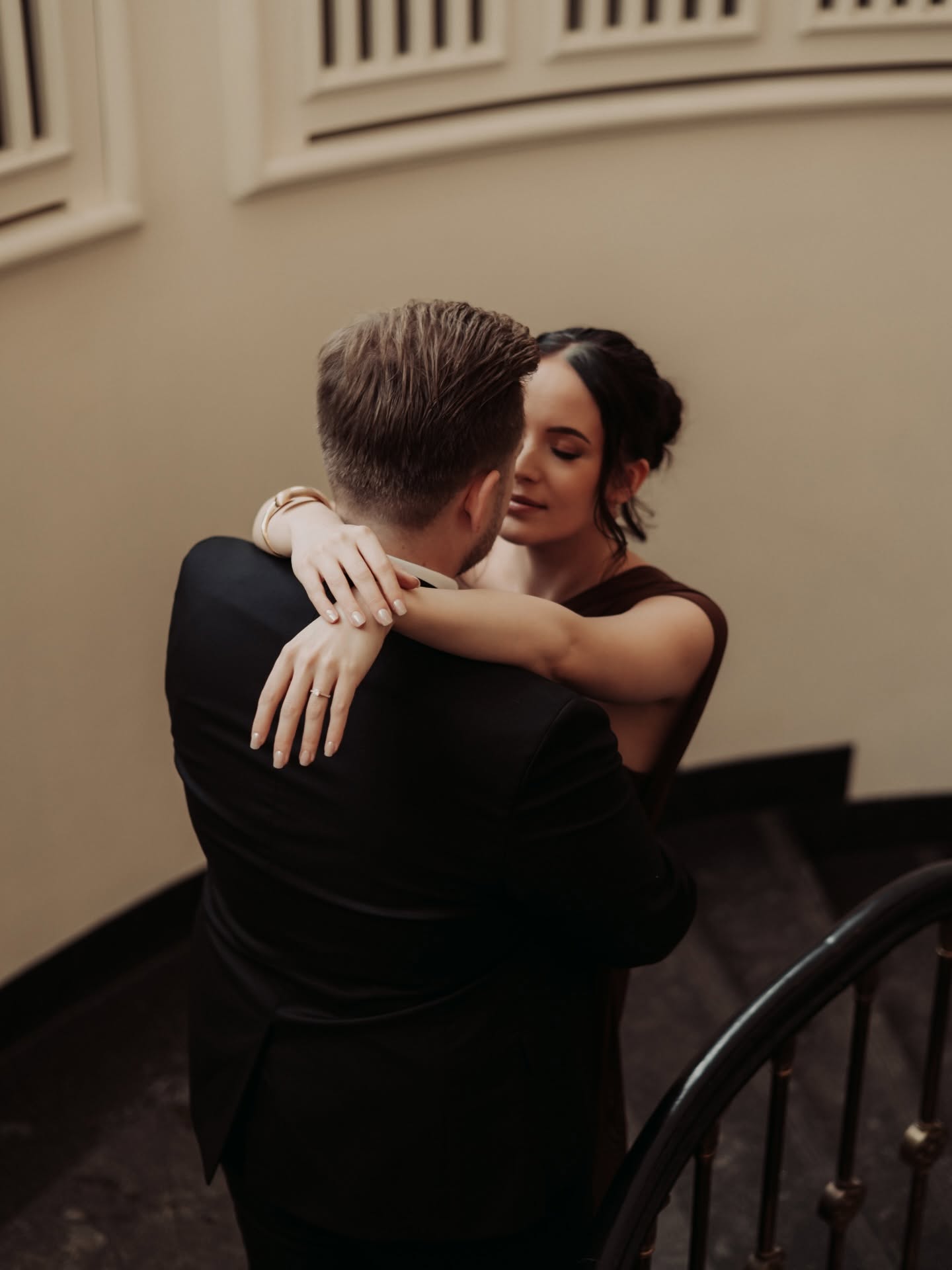 Katrin and Andreas holding each other on the stairs